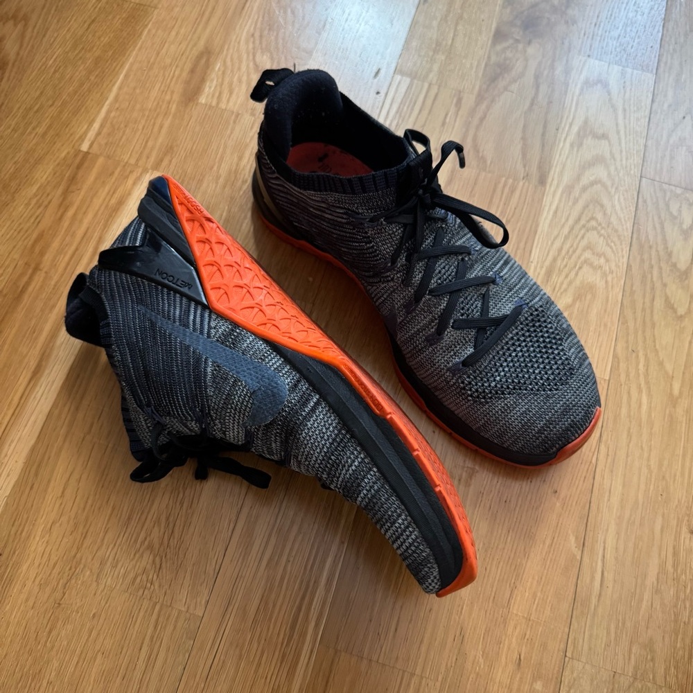 Nike Black and Gray Sneakers with Orange Accents